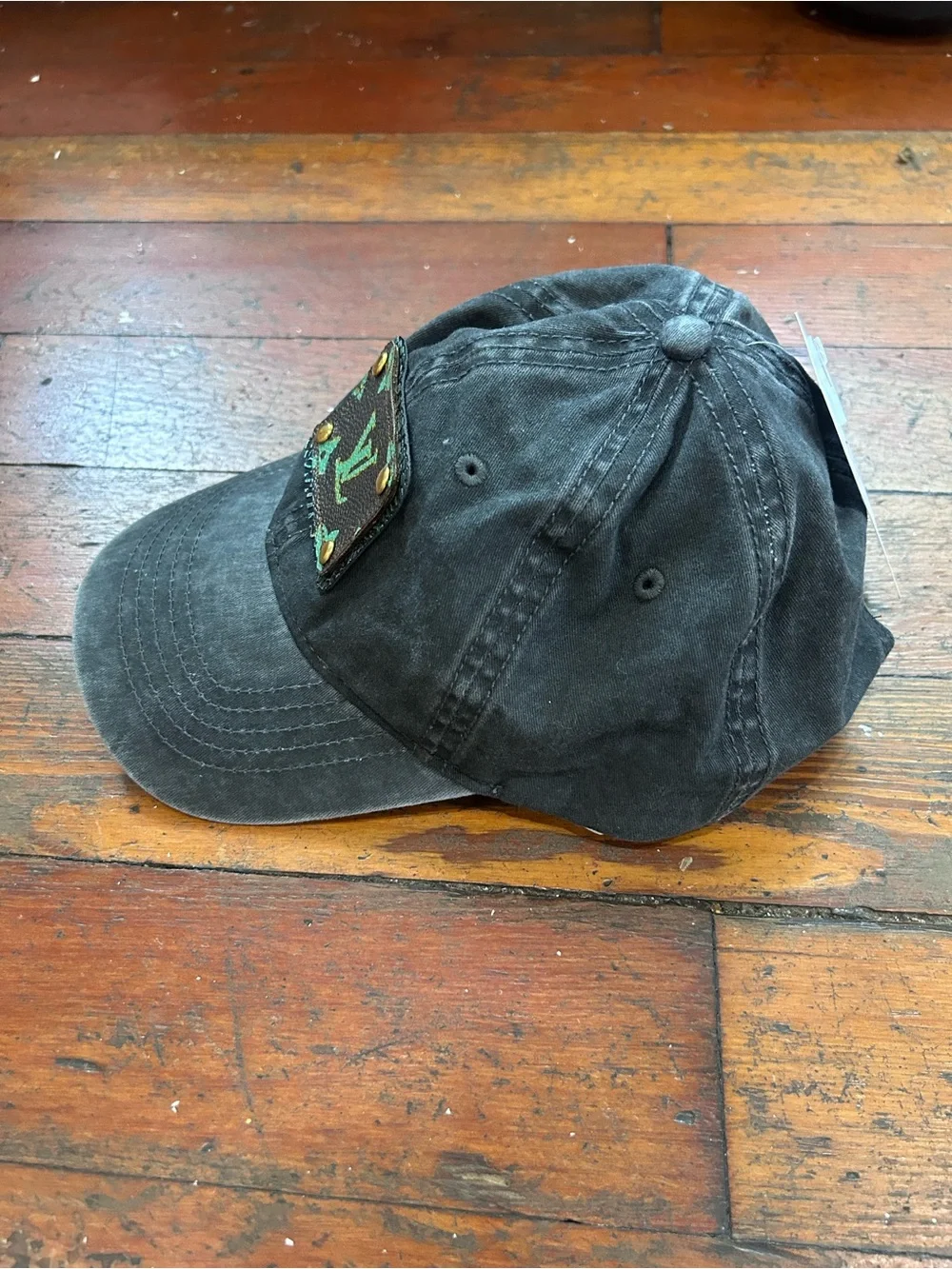 Upcycled distressed Louis Vuitton Black Baseball Cap with Green Monogram Patch